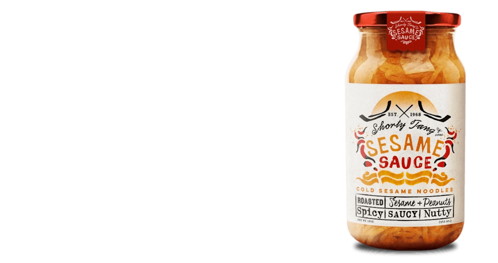 Glas mit Sesam-Sauce mit weißen Etiketten