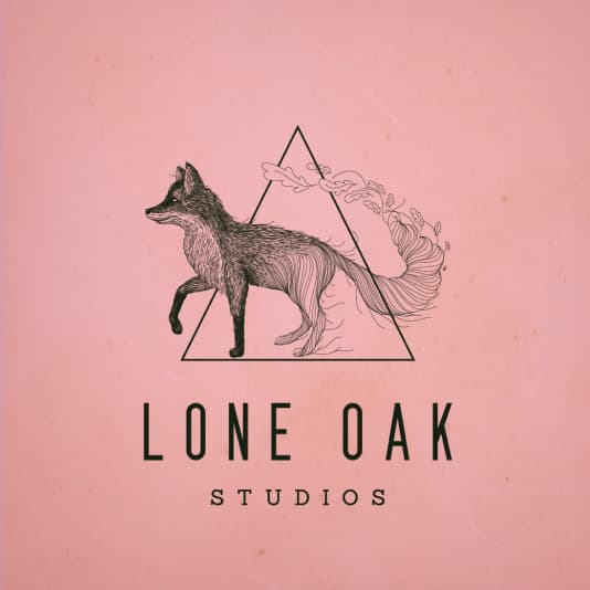 Logo design with a fox for the brand: 
Lone Oak Studios
